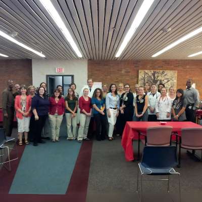 founding members of the richmond health and wellness program pose for a group photo at dominion place