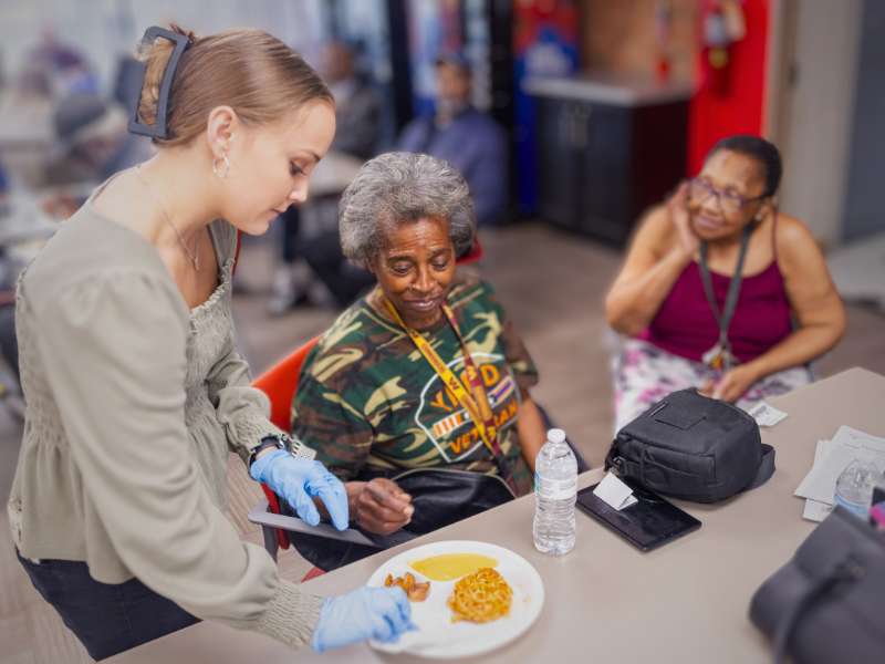 a mercy chef meal is shared with a mobile health and wellness program participant