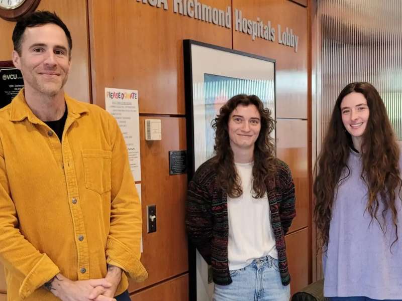 Samuel Cupper, Katie Nickels and Thomas Taylor Green in the lobby of the v.c.u. school of nursing